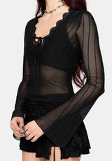 Black mesh top with sheer sleeves on a white background