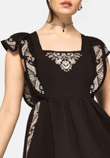 Bladeborn Embroidered Ruffle Front Mini Dress