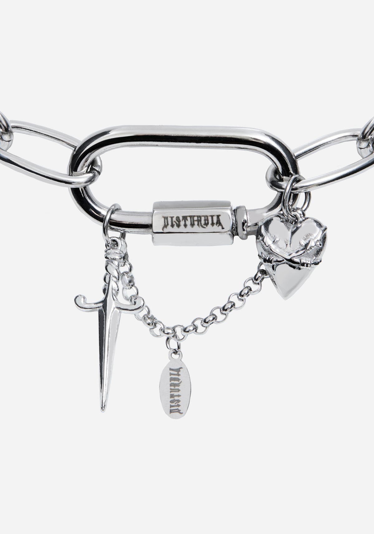 A silver-tone metal chain bracelet featuring a large open-link bar, a rectangular clasp engraved with 'DISTURBIA', and three dangling charms: a dagger, a broken heart, and a small oval tag.