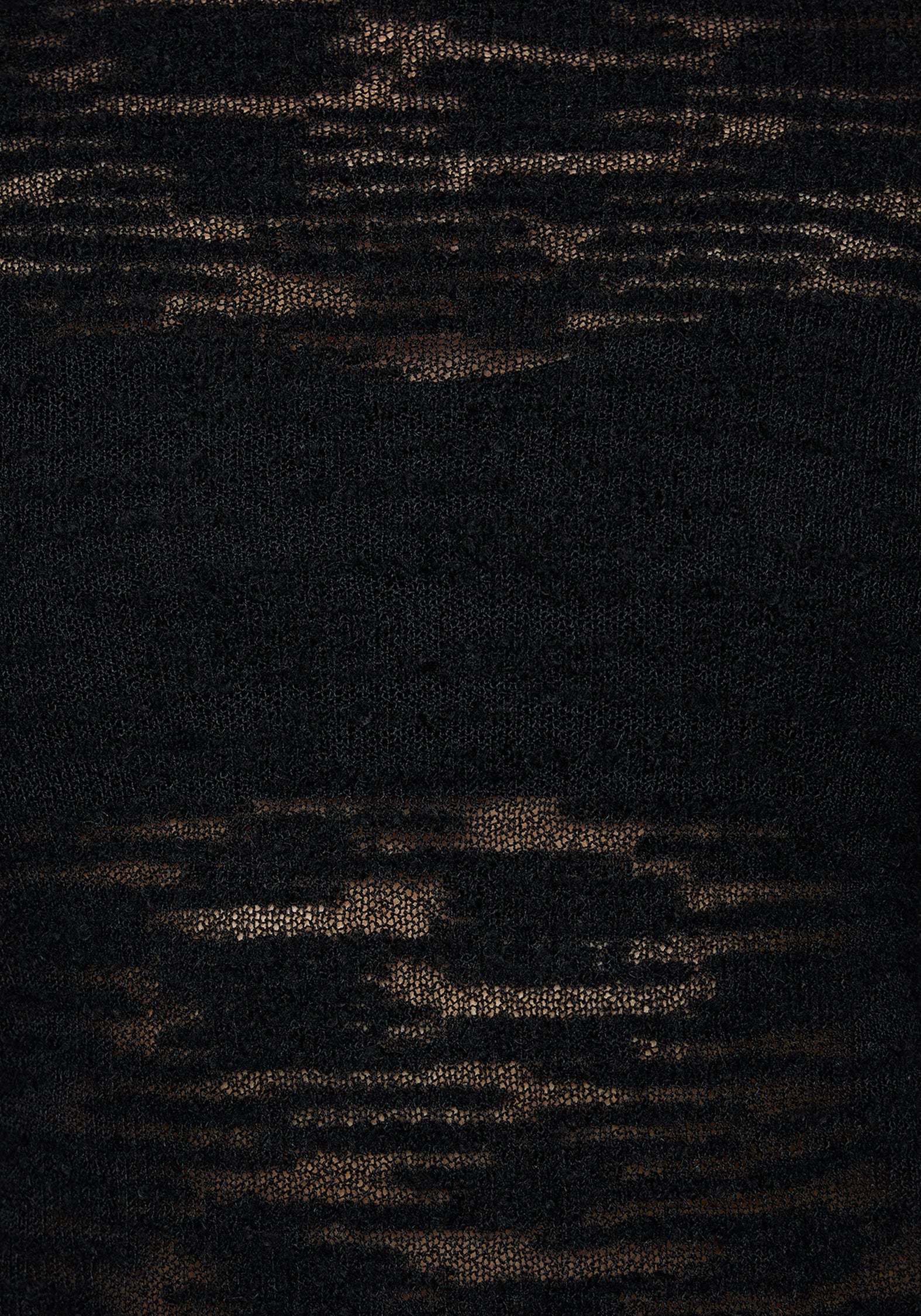 Close up of dark textured fabric with a subtle pattern